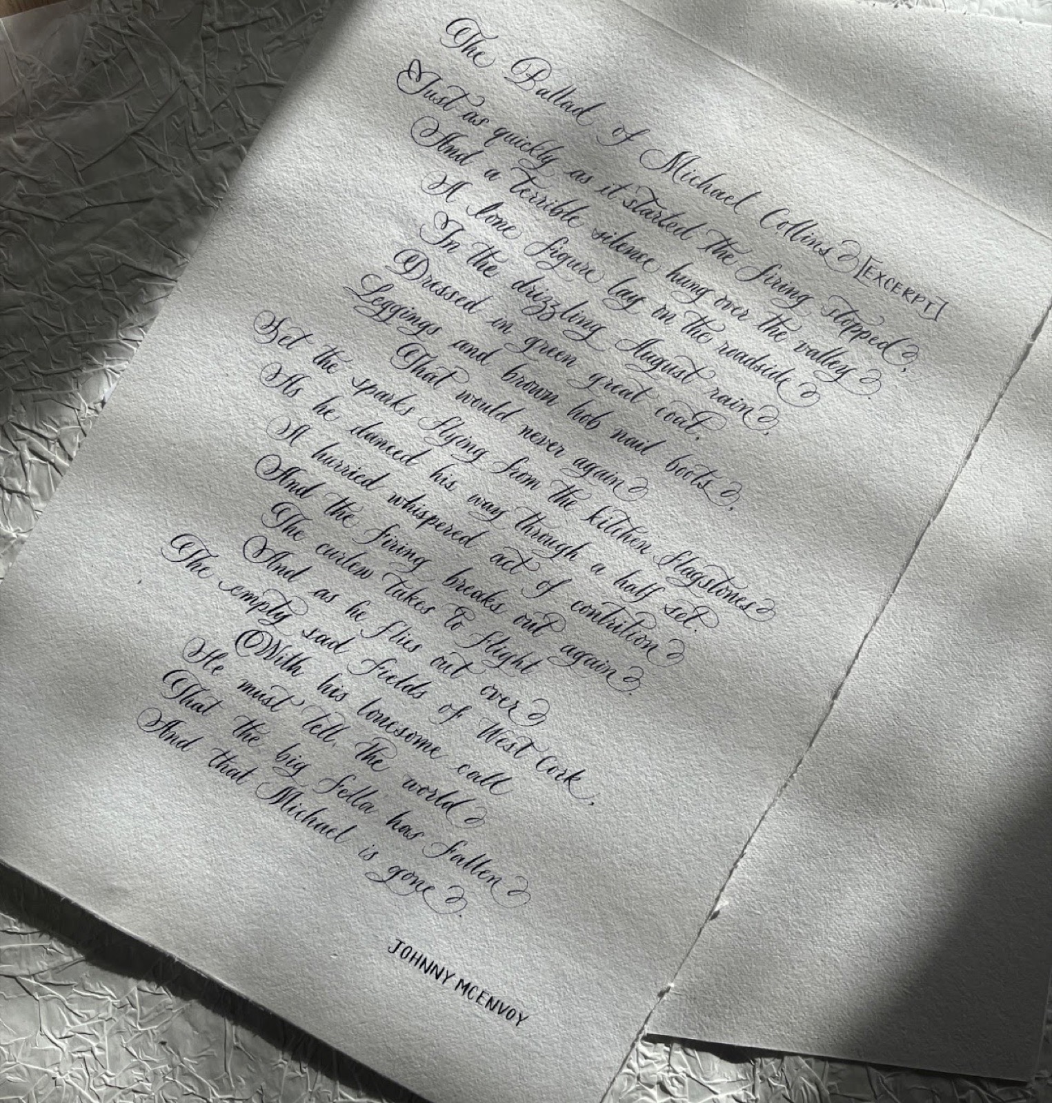 Handwritten song lyrics in calligraphy