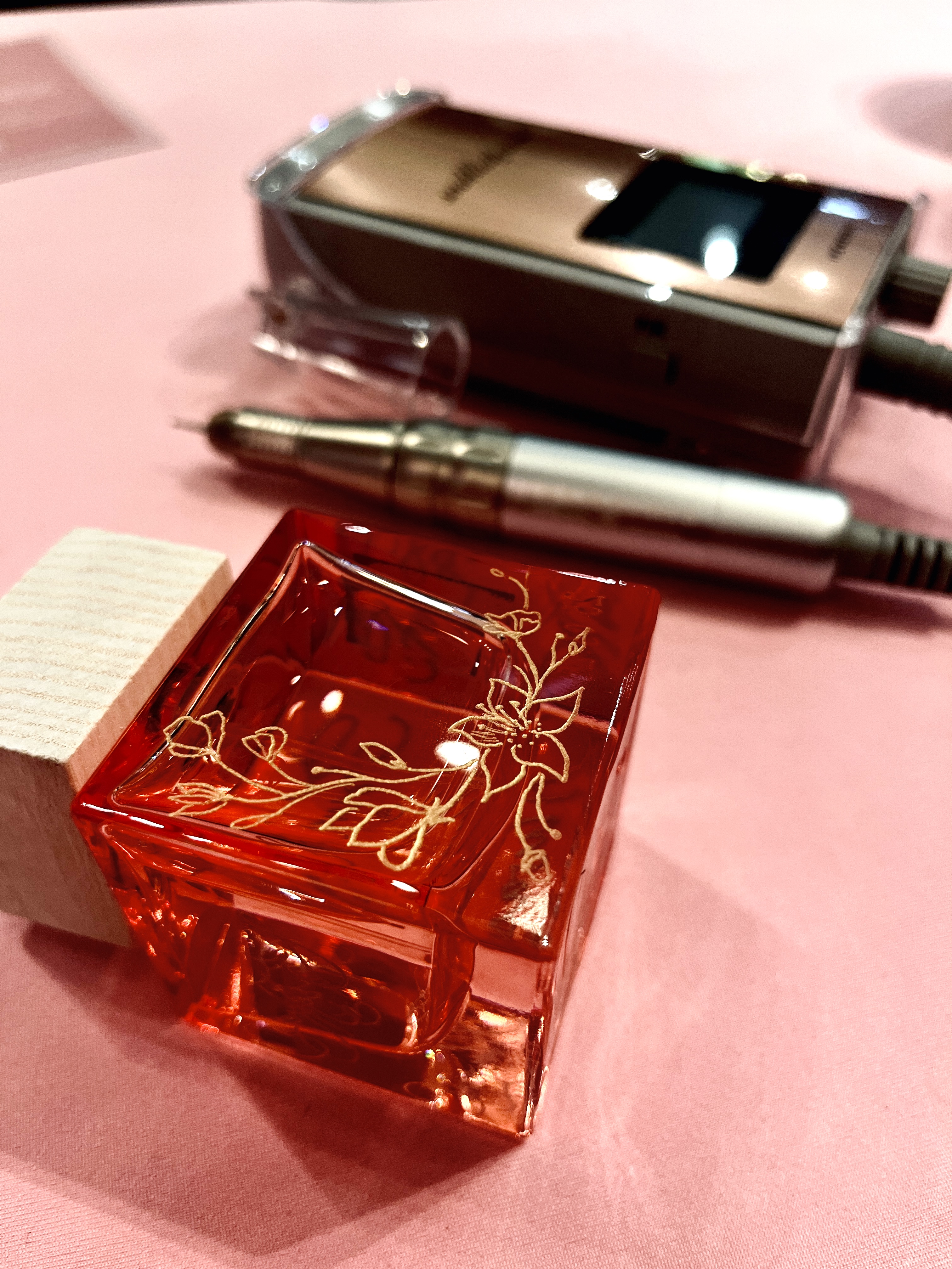 Onsite live engraving of a perfume bottle for a guest at a retail brand activation in Dublin